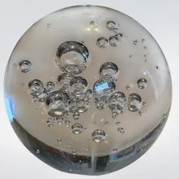 A19. Large clear glass large paper weight with bubbles