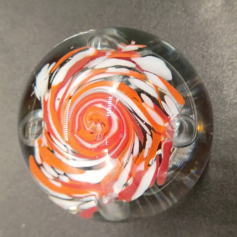 Small 2" Diameter Art Glass Paperweight Orange Red & White Swirl with controlled bubbles. Signed