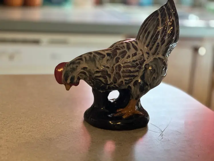 Vintage Ceramic figurine of a hen. 9 Inches
