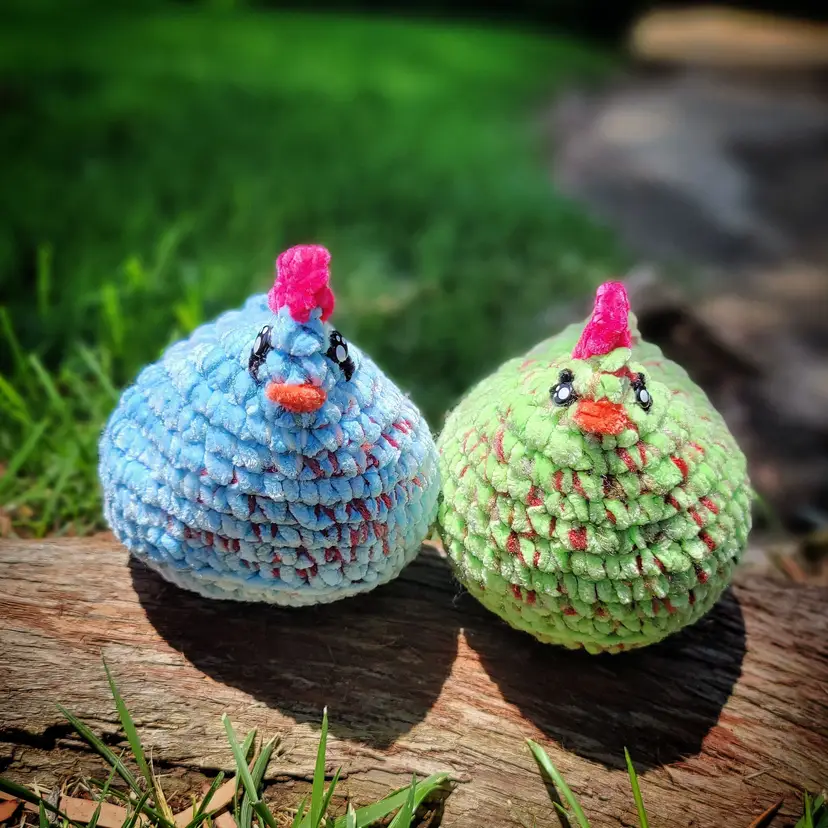 2 crocheted chickens