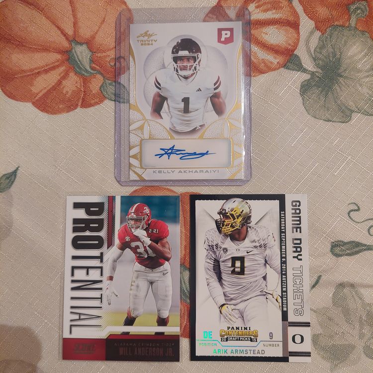 Lot of 3 College Football cards. Kelly Akharaiyi Auto +. Letter A.