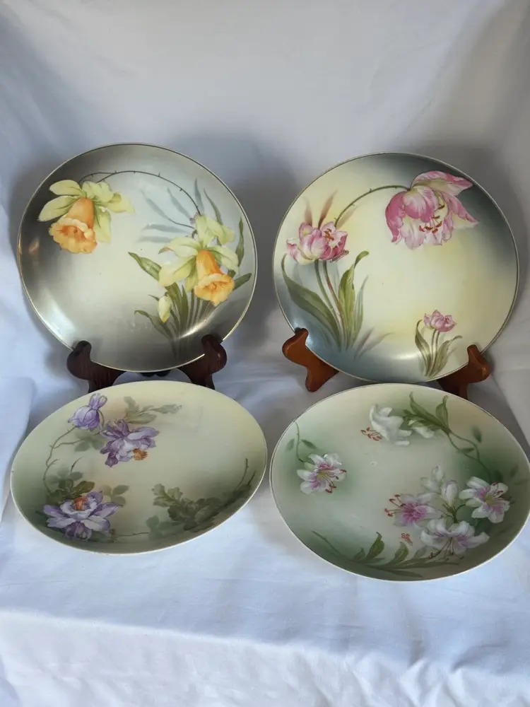 Set Of Four Antique Hand Painted Porcelain Plates, P.S.A.G Bavaria, Each Signed And Numbered; One Signed By Ragouse. Approx 7” Diameter.