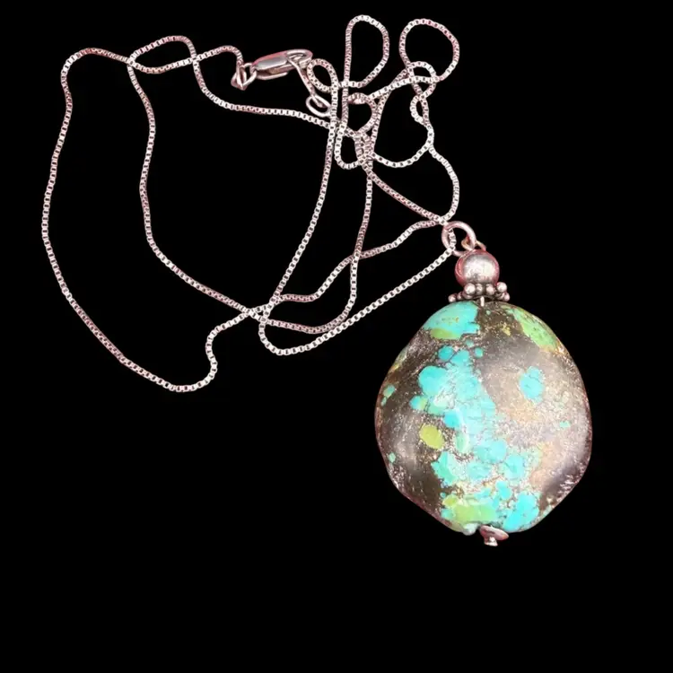 vintage turquoise nugget pendant necklace with a sterling silver chain
