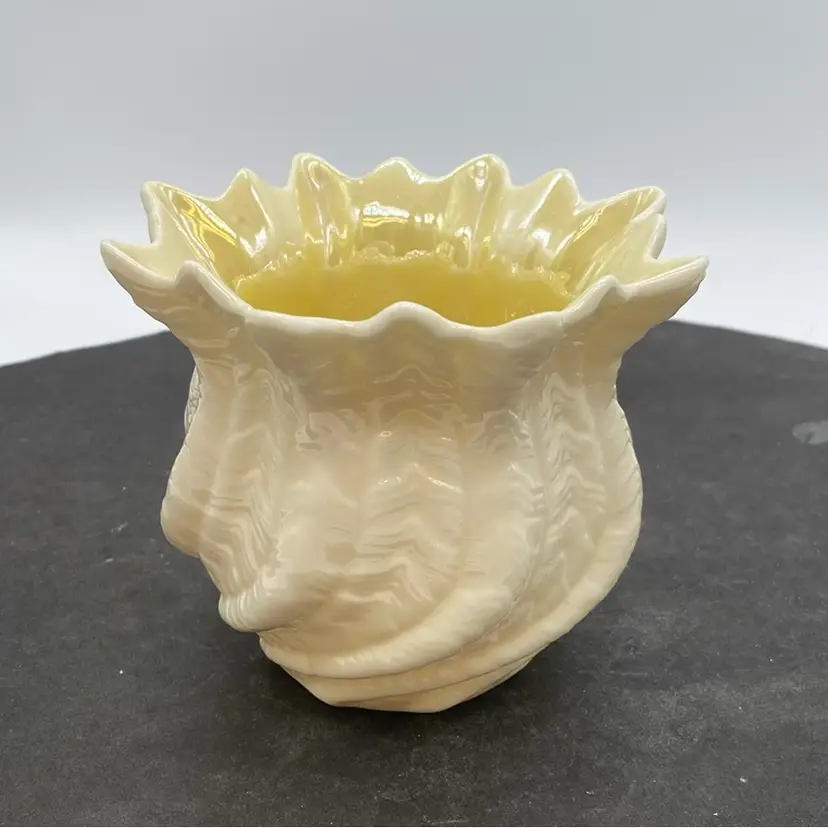 #1922 Belleek porcelain shell vase with a green mark, dating 1946-1955.