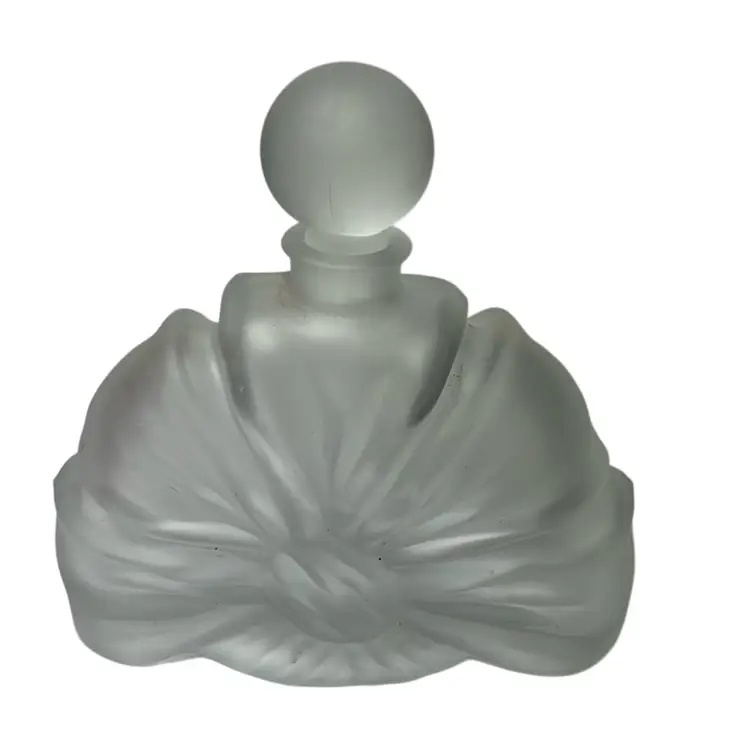 Vintage Perfume Bottle With Original Stopper. Made Of Frosted Glass In The Shape Of A Bow