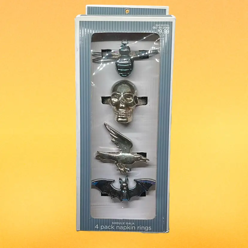 New and package set of four Ghoul’s gala four pack napkin rings.