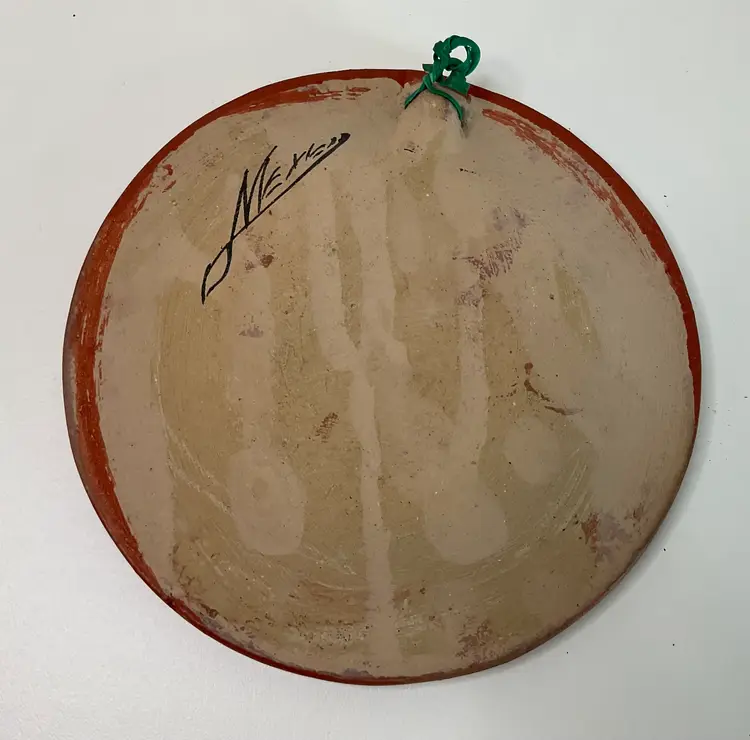 Handmade pottery plate 6” round with deer, butterfly, and flowers painted on it. Made in Mexico