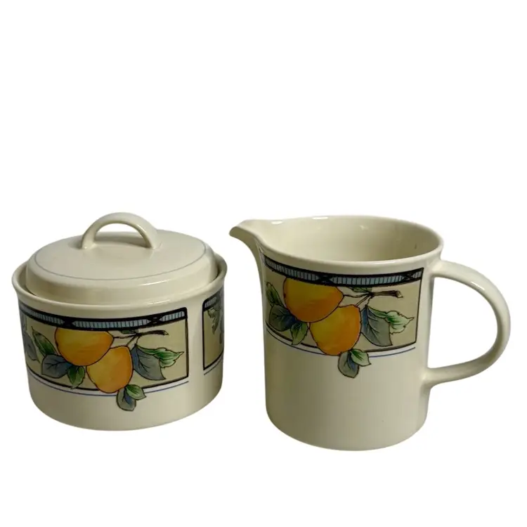 Mikasa Ceramic Creamer & Sugar W/Lid Intaglio Garden Harvest CAC29 Pears & Blueberries With Box
Creamer-3-1/4” T x 3” W 
Sugar 3-1/4” T x 4” W