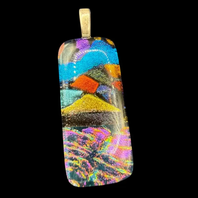 fused dichroic glass pendant featuring a mosaic pattern