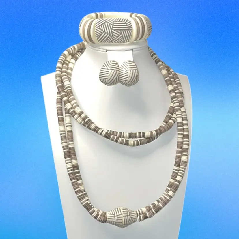 Vintage Avon Sirocco tribal patterned resin jewelry set. Bracelet Pierced Earrings And Necklace Double Strand 36 Inches.