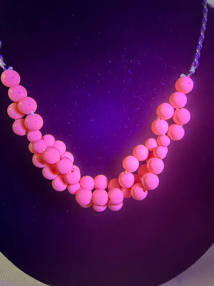 Pink Plastic Beads UV Glow