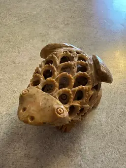Soapstone sculpture of a Frog with intricate openwork carving