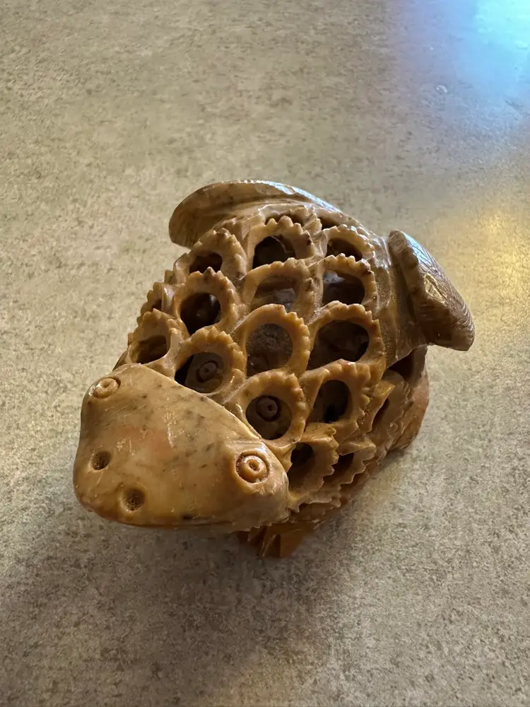 Soapstone sculpture of a Frog with intricate openwork carving