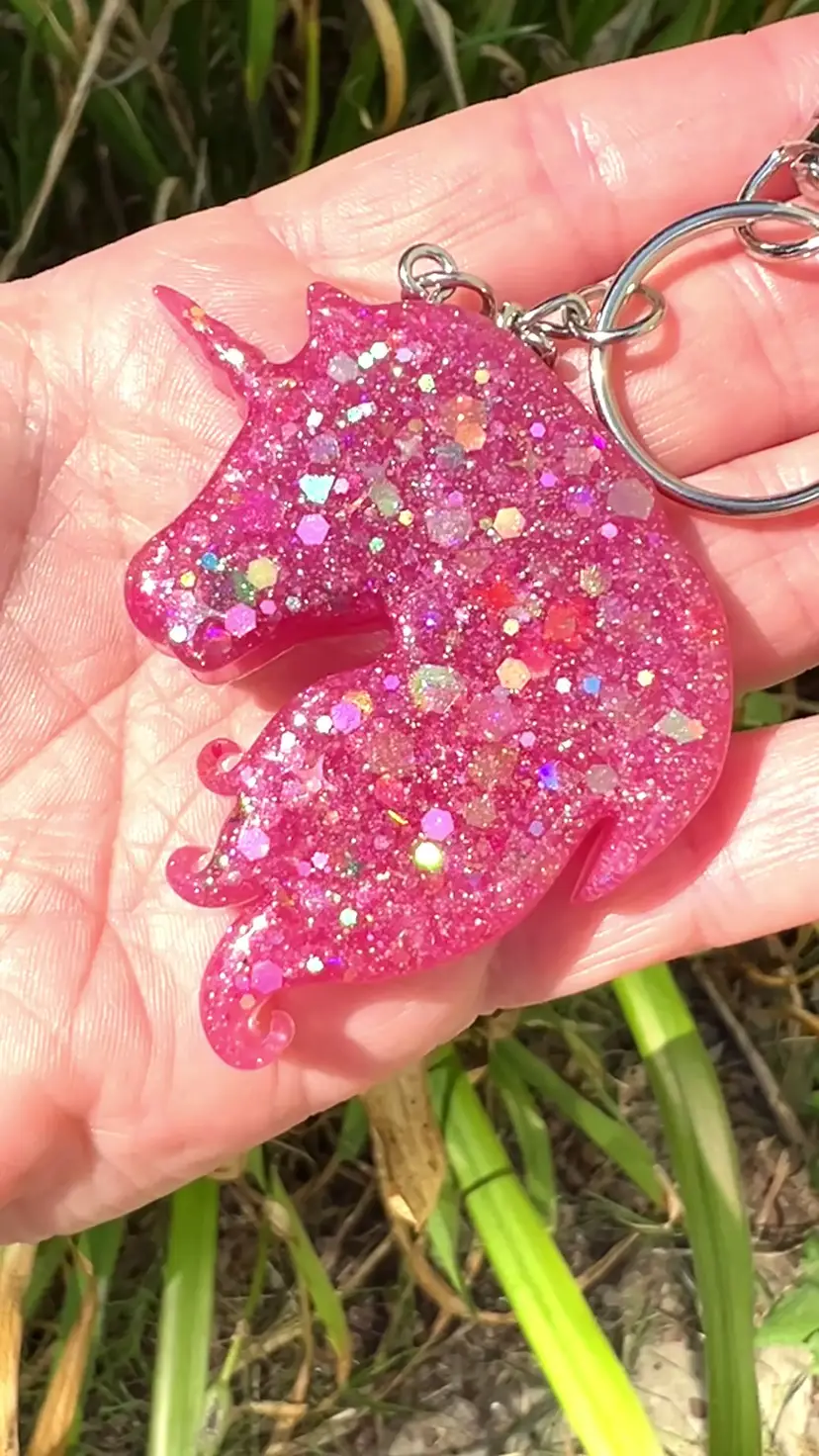 Pink Sparkly Resin 🦄 Unicorn Keychain. Handmade by me 🫶. Unicorn 2” wide x 2-1/2” tall.