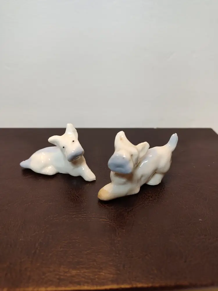 Pair Of Blue & White Glazed Dogs