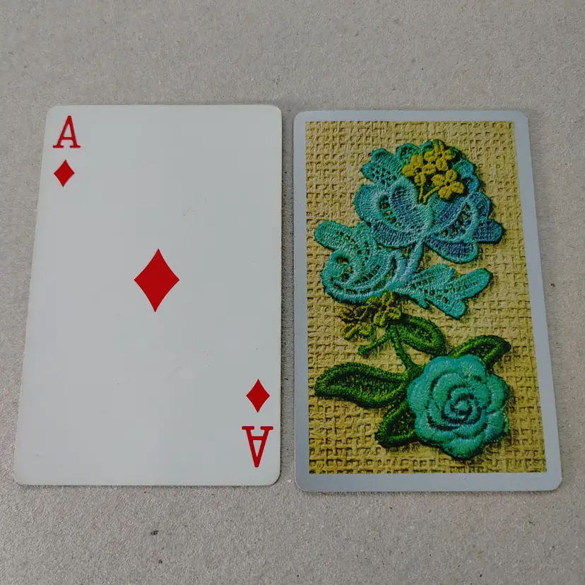1 Single Swap Card - Playing Card. Blue floral applique with lace card. Weave background. Made by Congress in OH. Dimension 2.5 x 3.5. Read description.