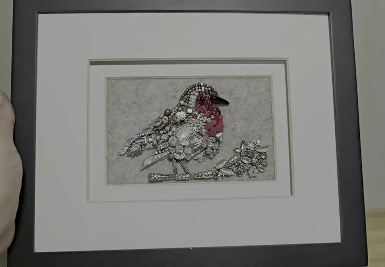 Beautiful Hand Made Jewelry Art Piece Featuring A Robin Sitting On A Branch