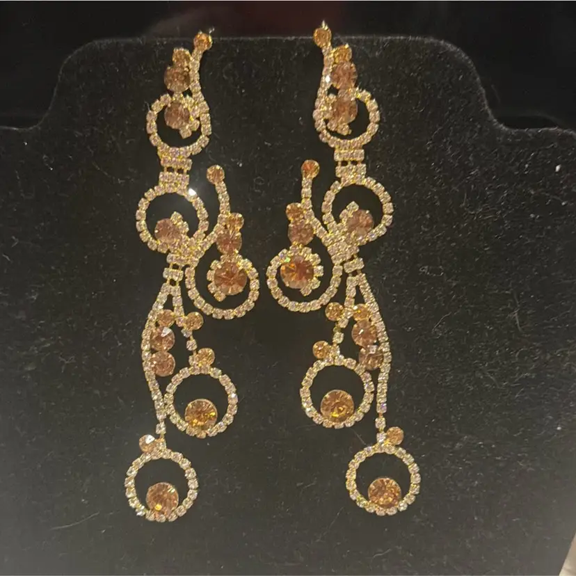 4 3/4 “ long glass pierced gold and crystal earrings
