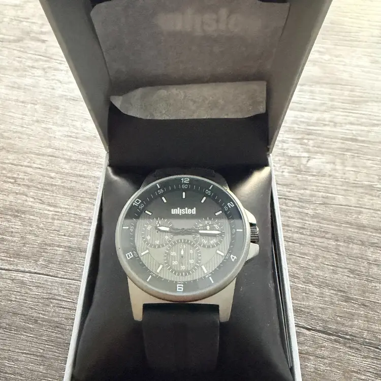 New $60 This is an Unlisted by Kenneth Cole men's quartz watch with a black dial and a black silicone