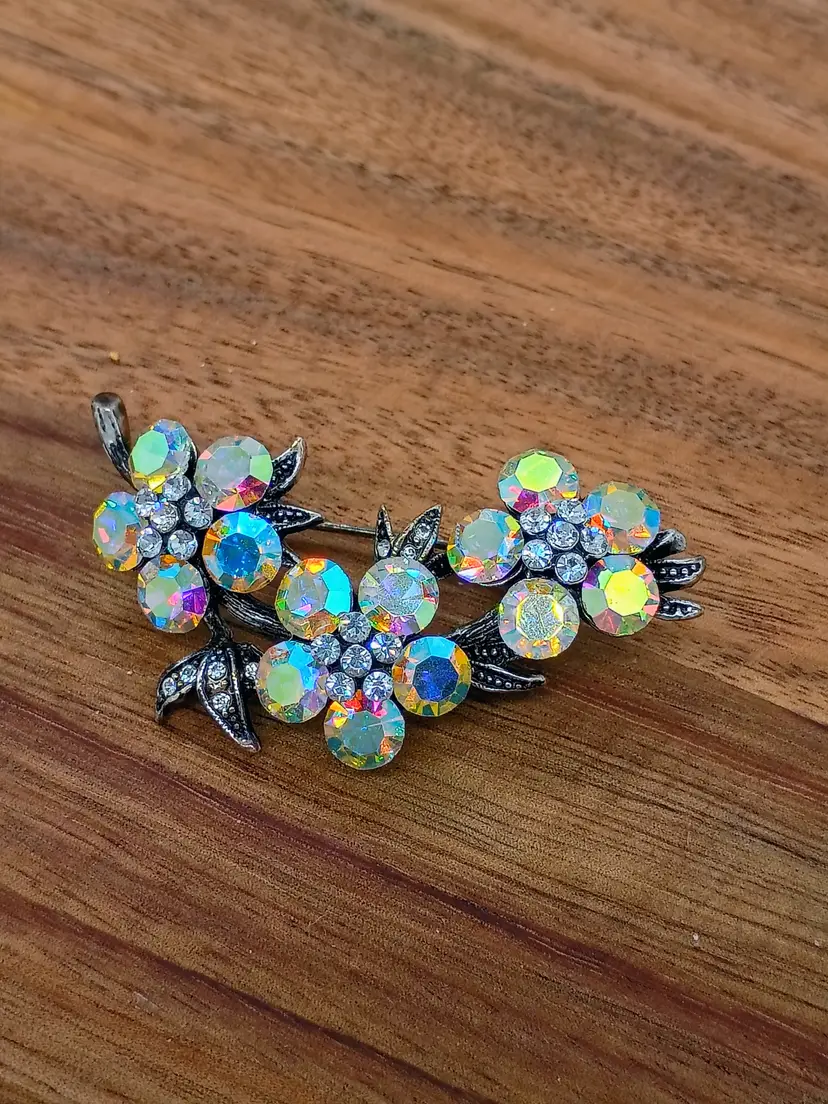 Vintage Silver Tone Aurora Borealis Rhinestone Flower Brooch Marcasite Details.