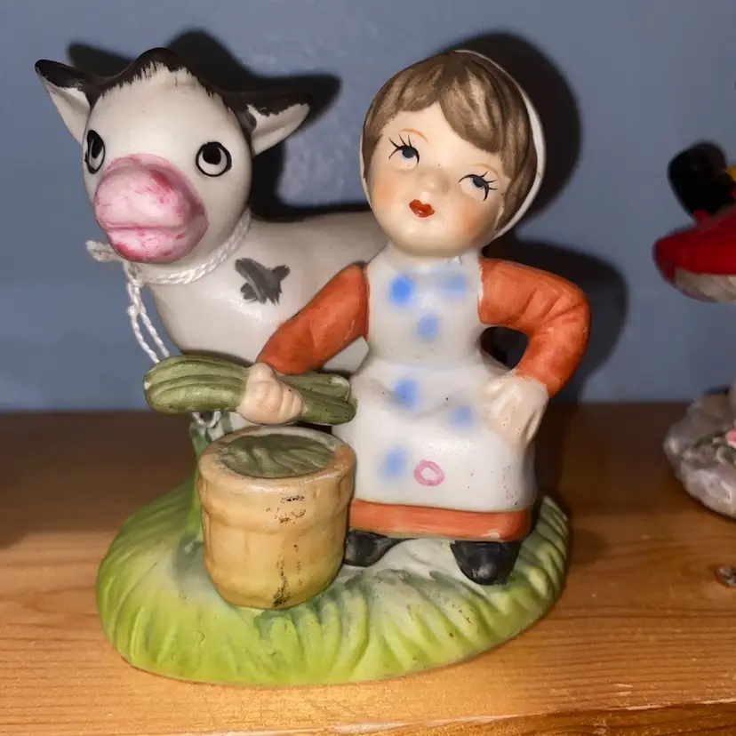 vintage farm girl with cow