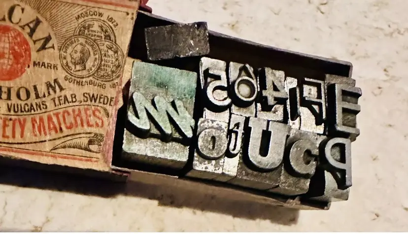 Small Letters And Numbers Metal Stamps In Vintage Matchbox