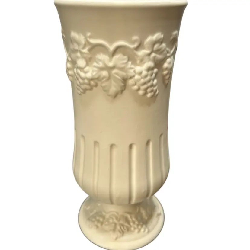White/Ivory Embossed Grapes And Vines Numbered E-3129 Footed Ceramic Vase
8 1/2 “ Tall One Chip See Picture