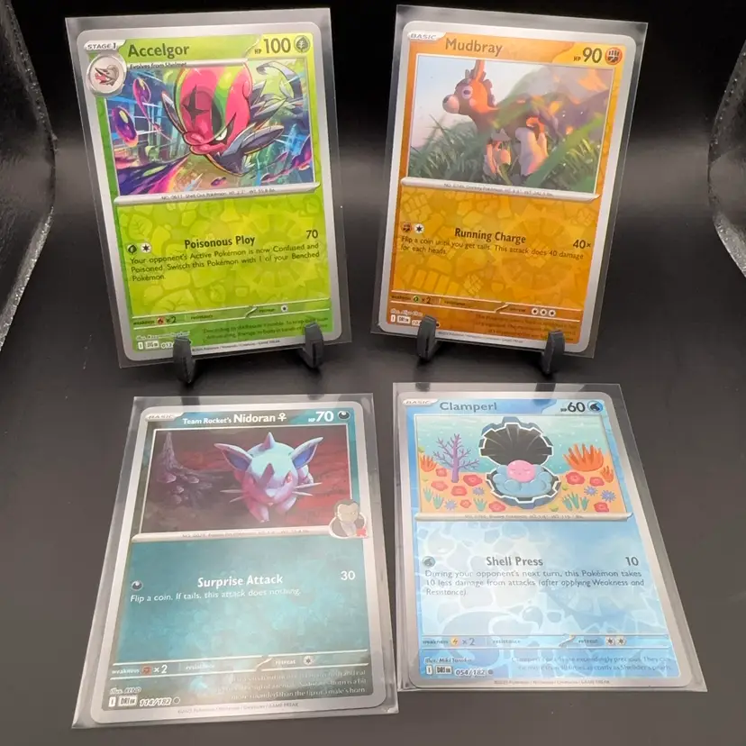 Pokémon Reverse Holo Lot Accelgor, Mudbray, Team Rockets Nidoran, Clamperl