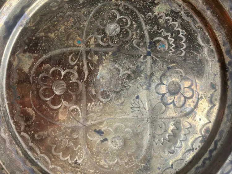 A vintage etched brass decorative tray with floral motifs.  - 9”