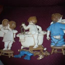 Vintage Sexton wall plaques