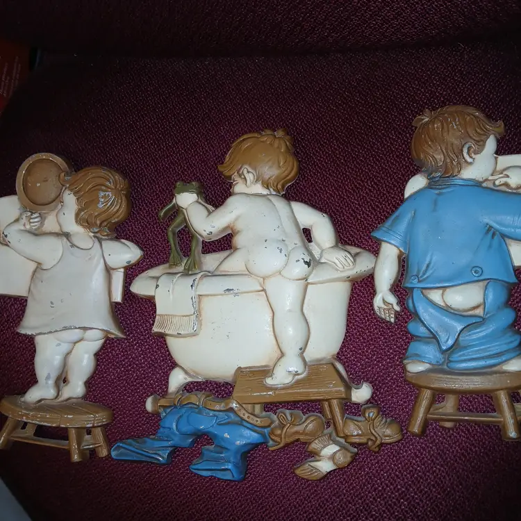 Vintage Sexton wall plaques