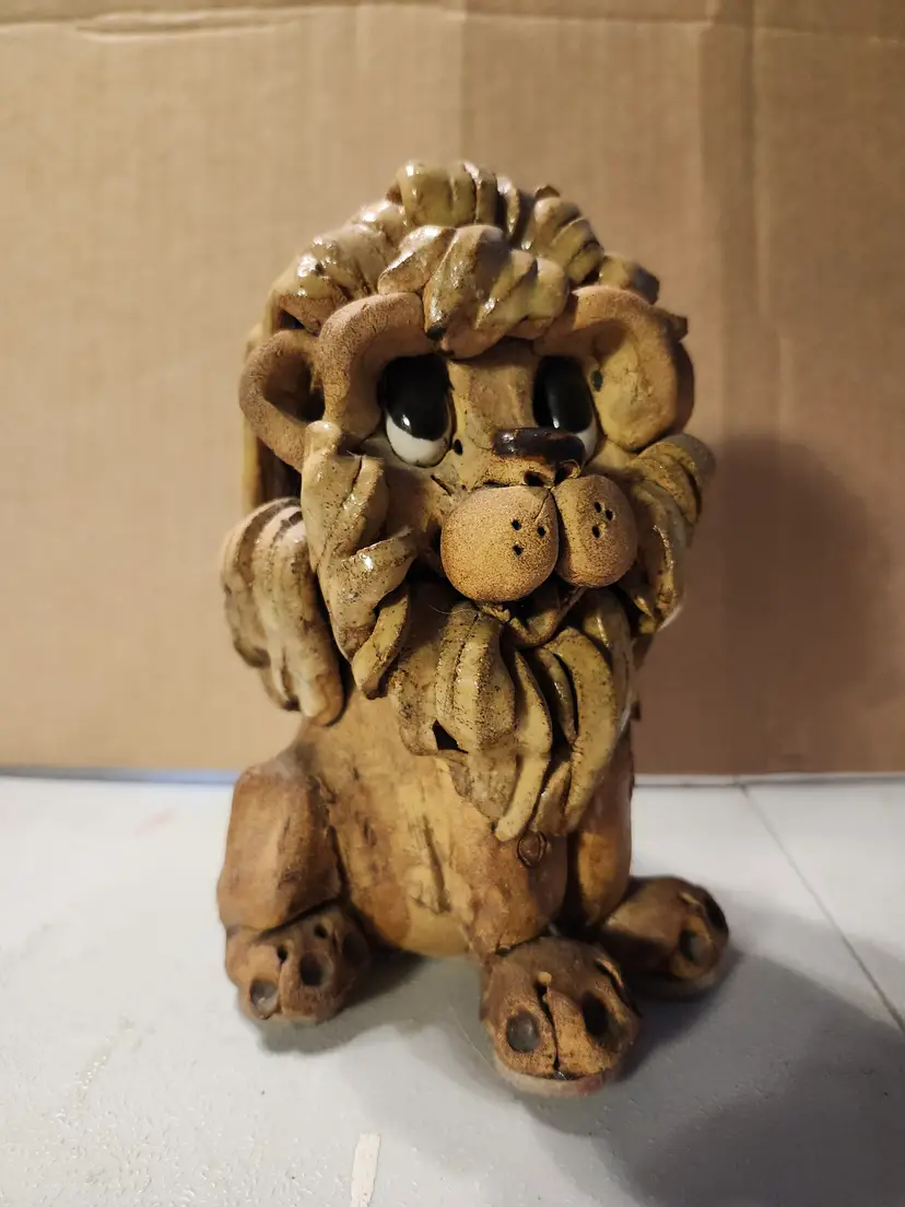 Charming handmade pottery Lion Figurine