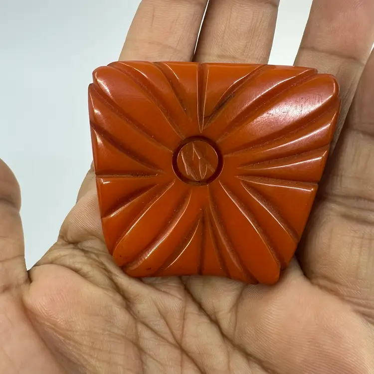 Carved Butterscotch Bakelite Clip-on Pin Brooch?