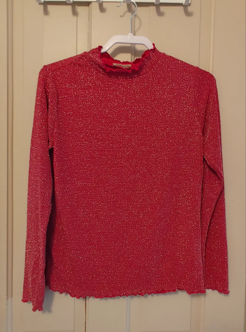 Top- Brand: Kori. Size Small. Red with silver top. 57% Nylon, 35% Wire, 8% Spandex. 1 small snag in front.