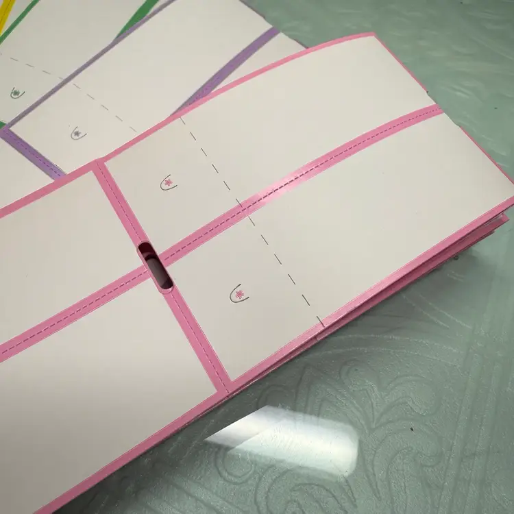 A Rainbow Of Unprinted, Thermal, Retail Clothing Tags