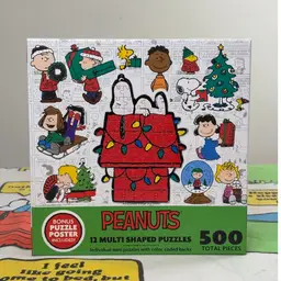 Peanuts 12 Multi Shaped Puzzles - Sealed