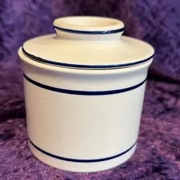 Vintage Ceramic Country Butter Keeper Crock Bell White Blue Accents. Beautiful aging and Crazing.
Approximately 4” tall. (would Use for decoration only due to Crazing)