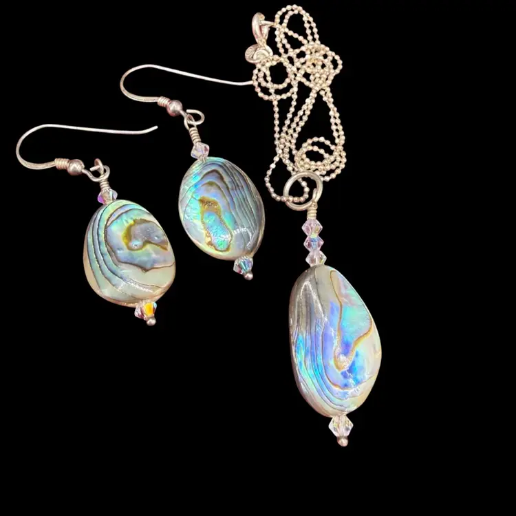set of sterling silver and abalone shell drop earrings with a matching pendant necklace