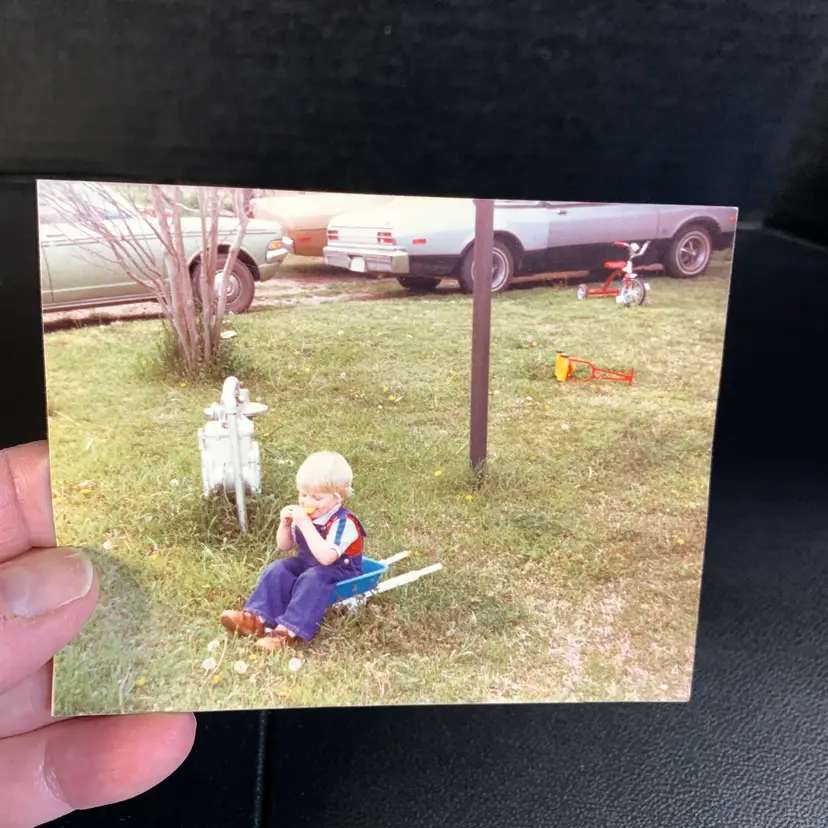 Boy in Kids Wheelbarrow Photo