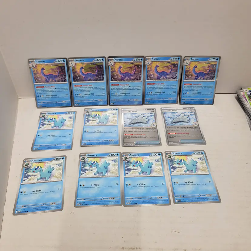 lot of 13 pokemon cards sail fossil amaura and aurorus
