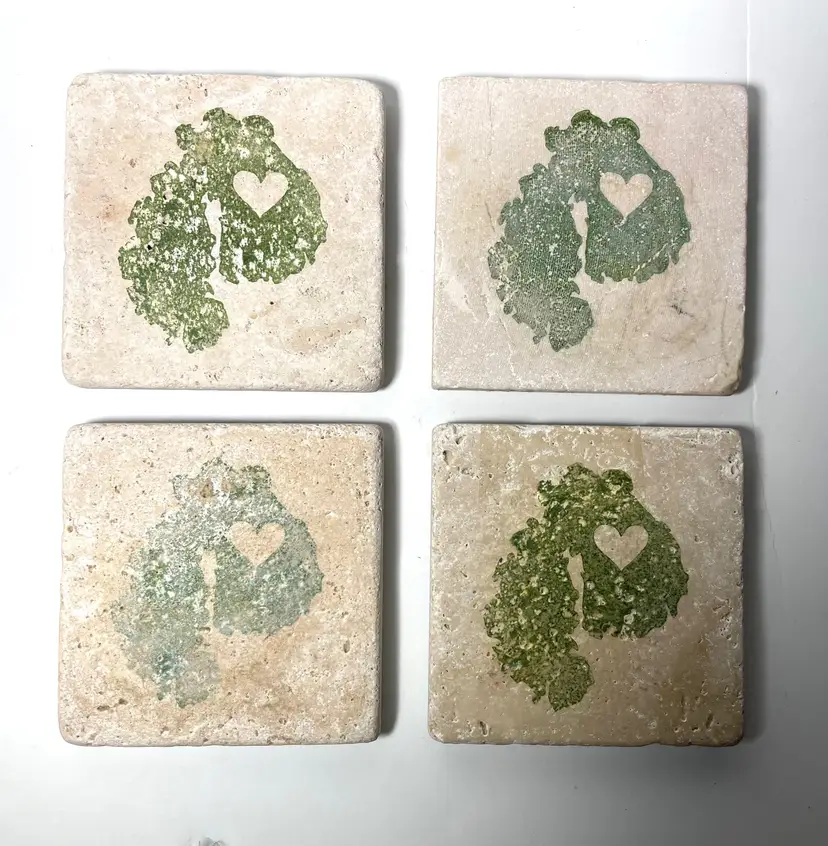 4 Stone Coasters. Light   Beige  Colored With Green Sponged Paint And Heart