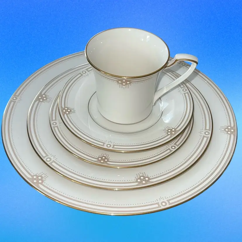 Noritake "Satin Gown" fine china. Produced 1973-1984, This pattern features a cream-colored background with gold trim and a distinctive raised dot and line design. Weddings, Holiday, Special Occasion . No Condition Issues