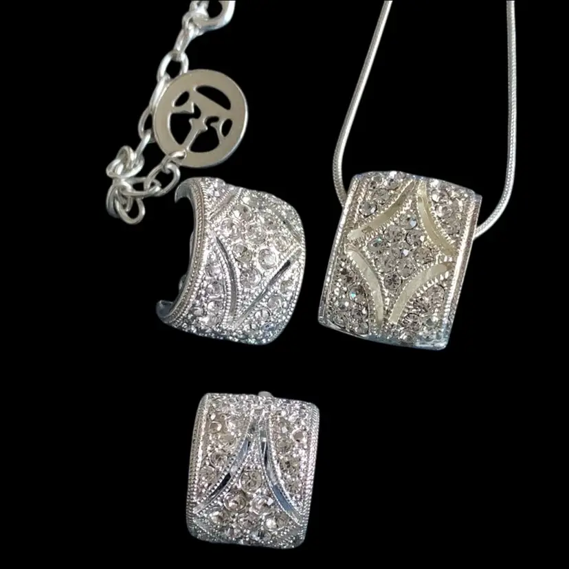 1990s Trifari Silver Tone Brilliant  White Pave Rhinestones 
Unmarked Silver Tone Half Hoop Earrings With Pave White Rhinestones