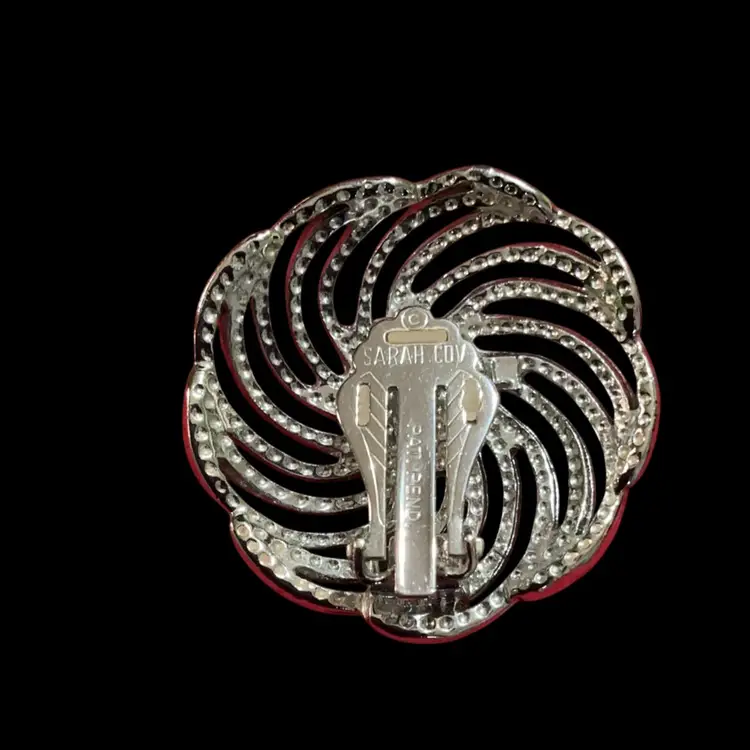 Vintage Silvertone Sarah Coventry Large Round Swirl Clip On Earrings With Black Glass In Center.