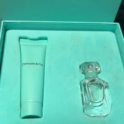 Tiffany & Co. miniature fragrance gift set with perfume and lotion. .17 Oz