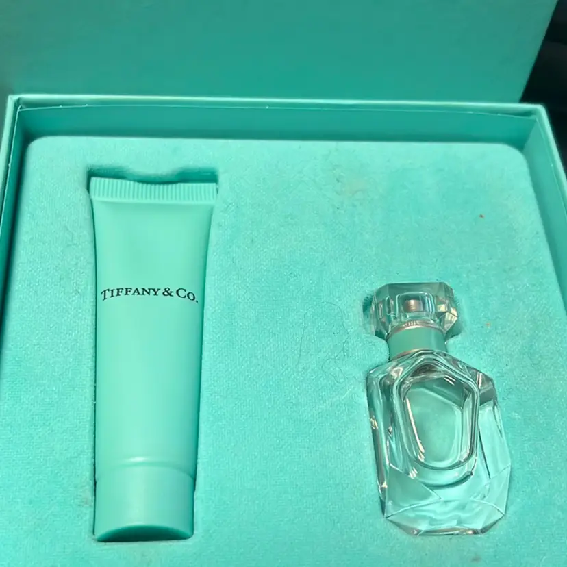 Tiffany & Co. miniature fragrance gift set with perfume and lotion. .17 Oz