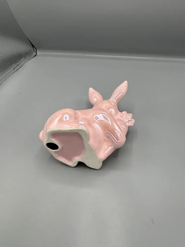 Glossy pink ceramic Easter bunny with carrot
