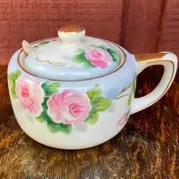 Antique Nippon Hand Painted Sugar Bowl With Lid And Spoon. White & Blue With Pink Roses & Greenery Motif With Gold Gilt. 2.5”h.