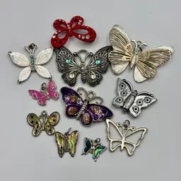 Grouping Of 11 Butterfly Costume Jewelry Pendants