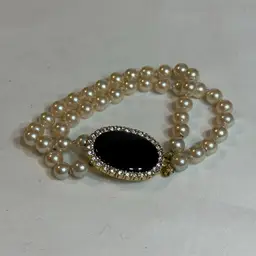 Double Strand Faux Pearl With Black Acrylic Center And Rhinestone Accent Bracelet 7”